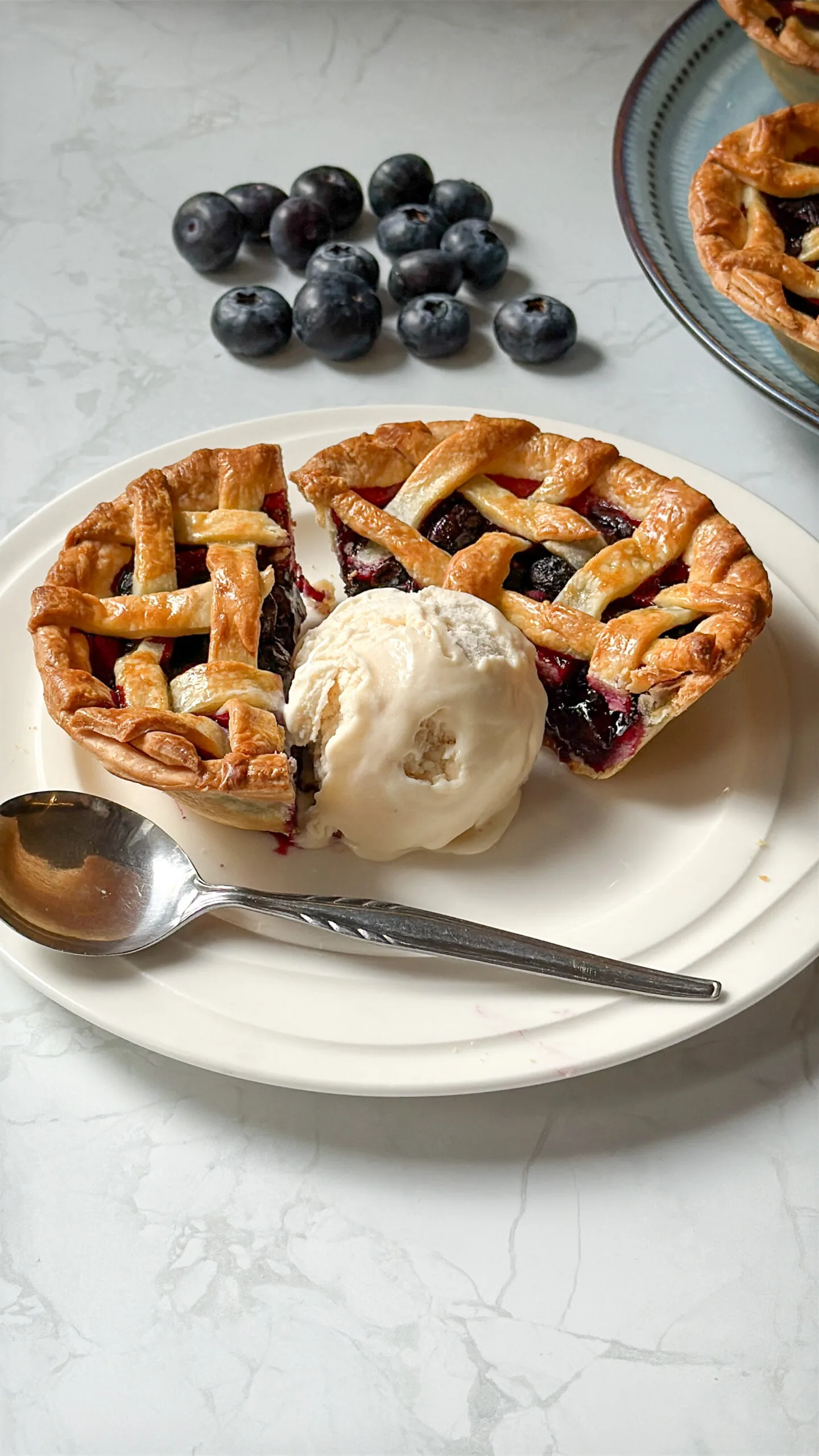 Warm Blueberry Pies with vanilla ice-cream