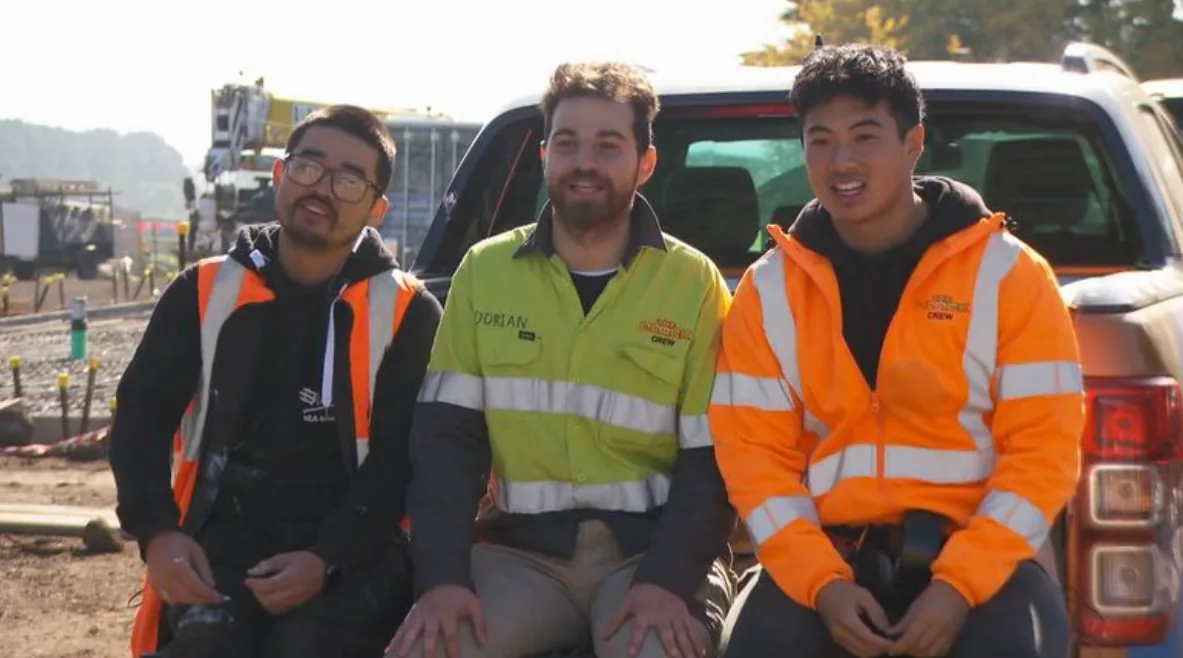 Kev, Dorian and Teng from Travel Guides working on The Block
