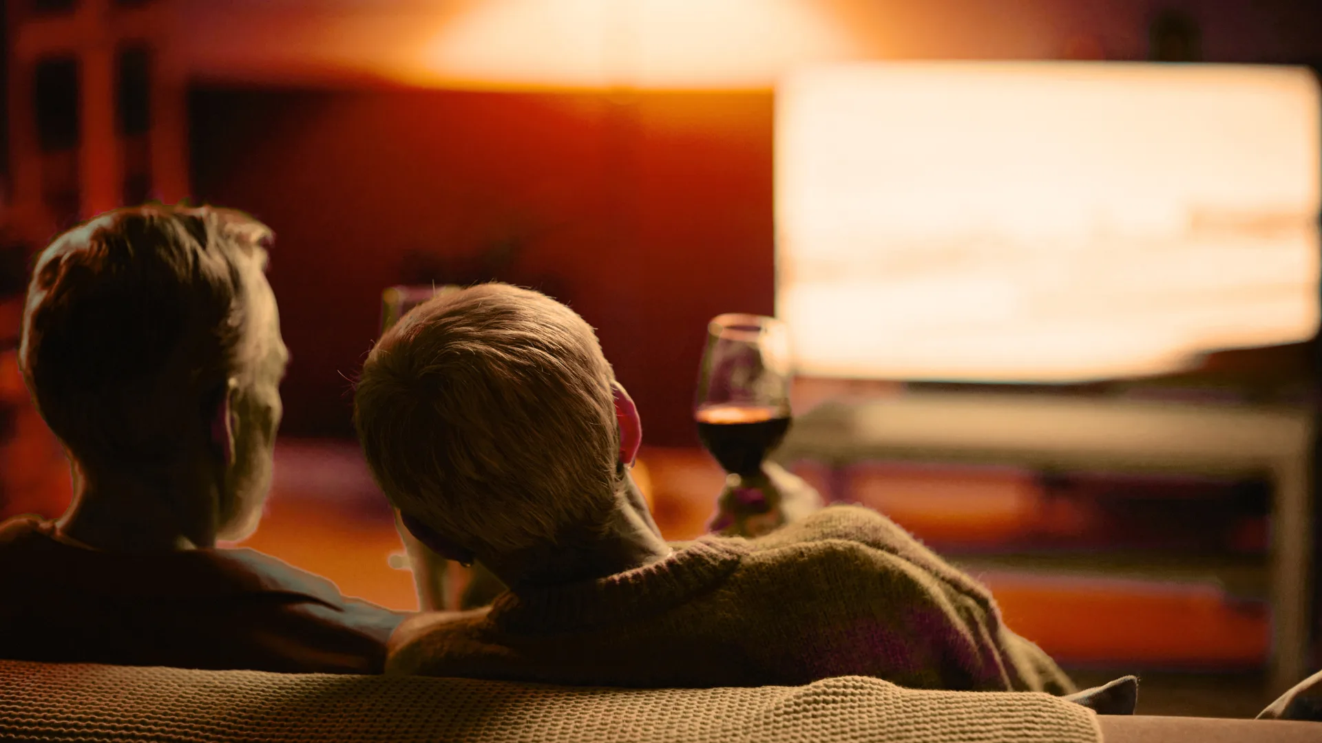 Couple watching a movie on the couch