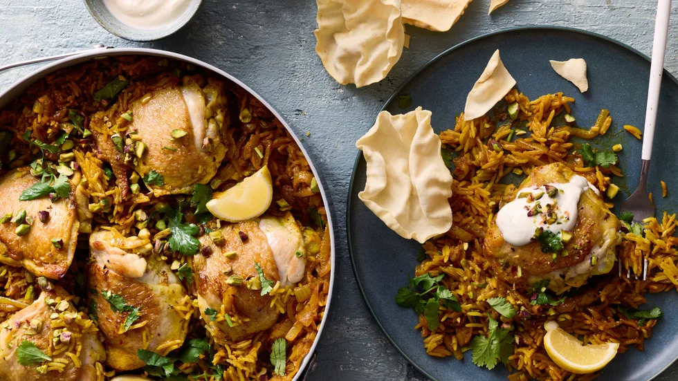 Tikka Masala Chicken Pilaf served with yoghurt and pappadams