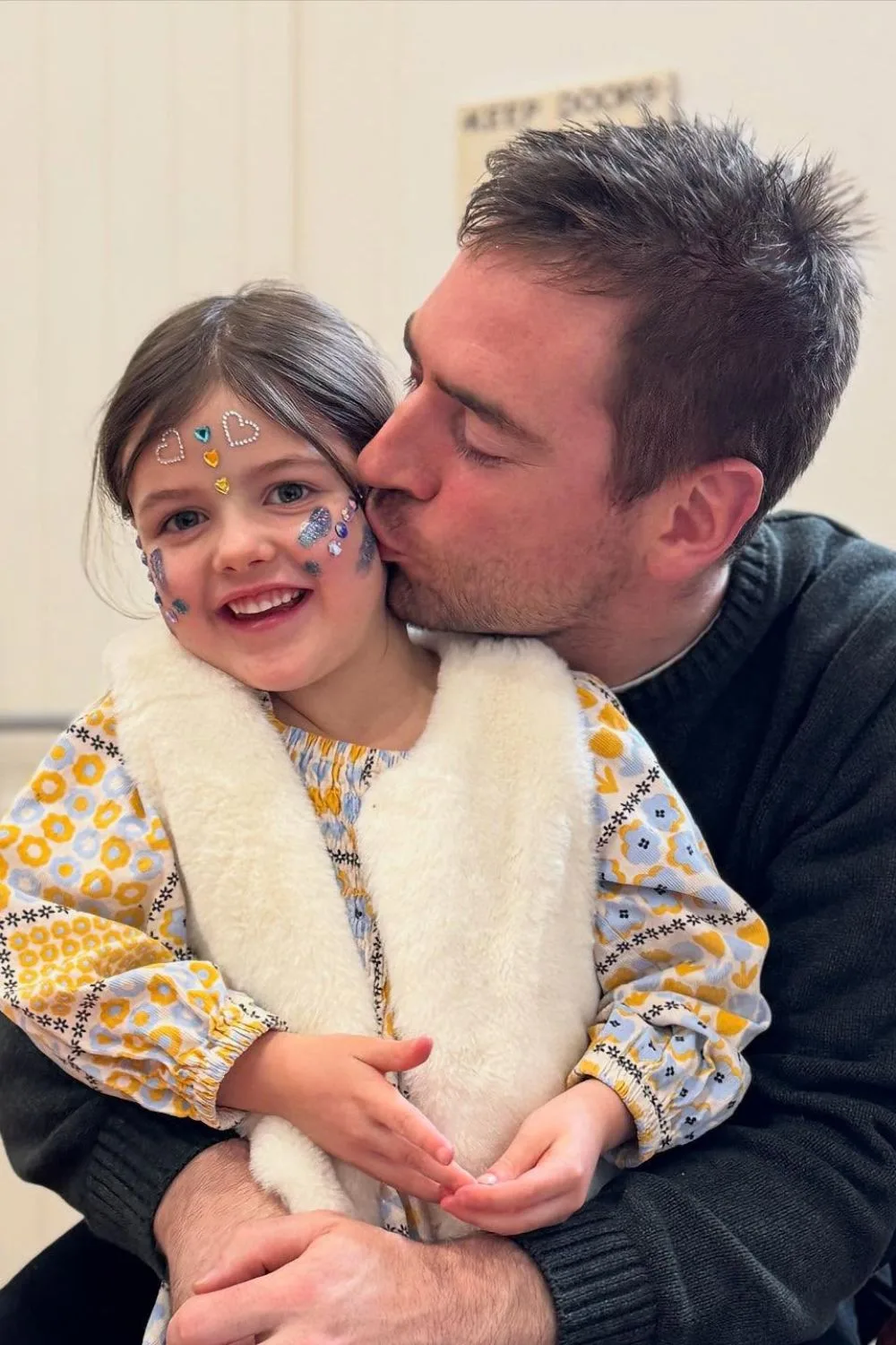 MasterChef star Callum Hann cuddles his daughter Elle