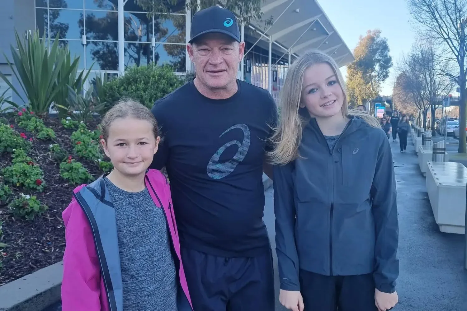 Foreman Keith poses with his kids before a running event