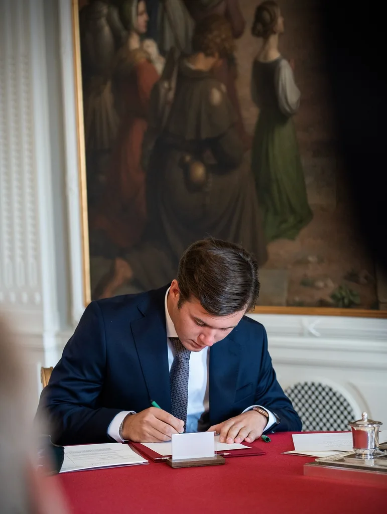 Crown Prince Christian Denmark signing documents
