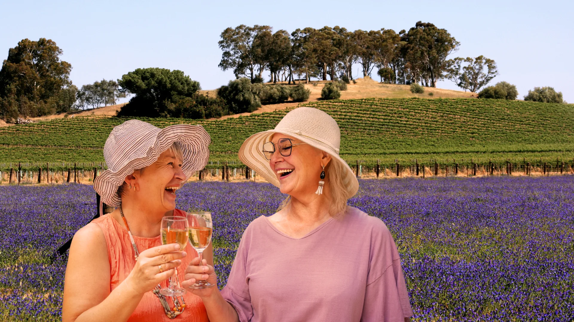 Two women laughing in a lavender field