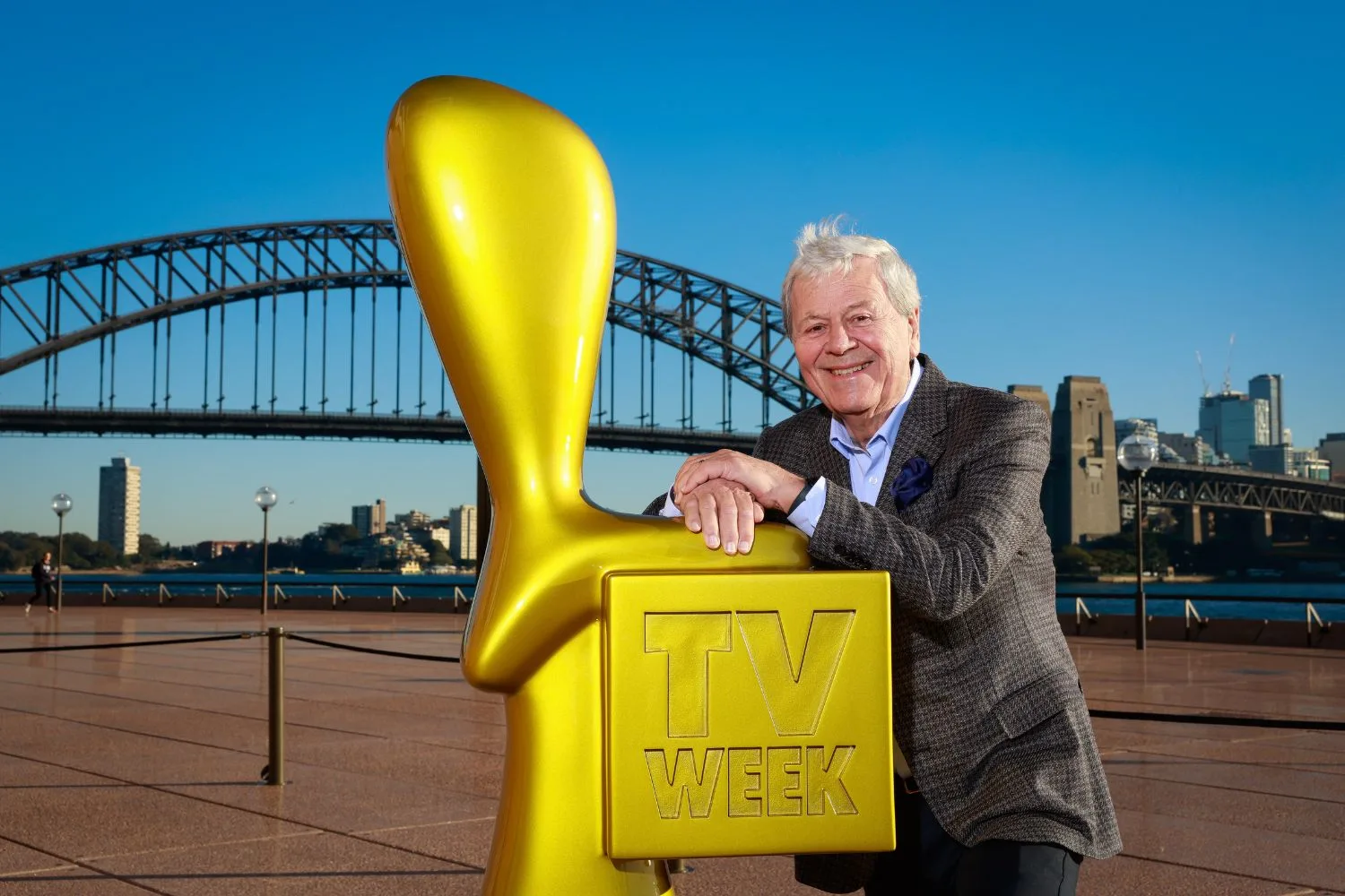 Ray Martin poses in Sydney with a giant Logie