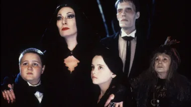 The cast of The Addams Family on set