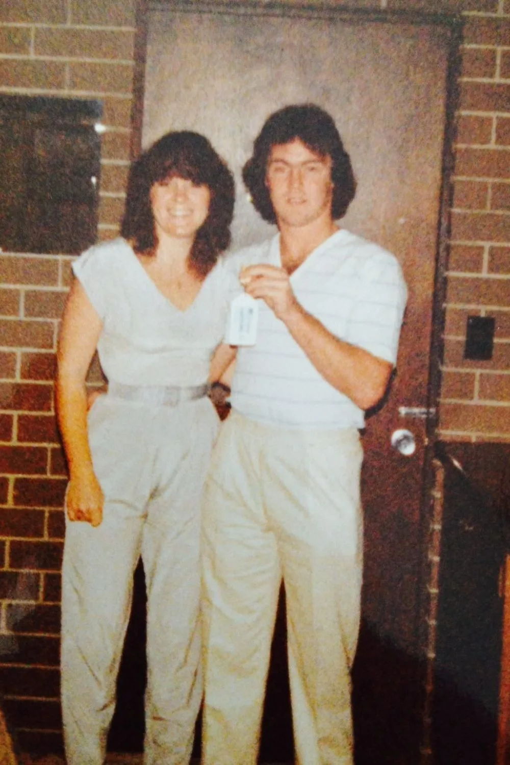 An old photo of Lee and Keith together in their younger years with big hair
