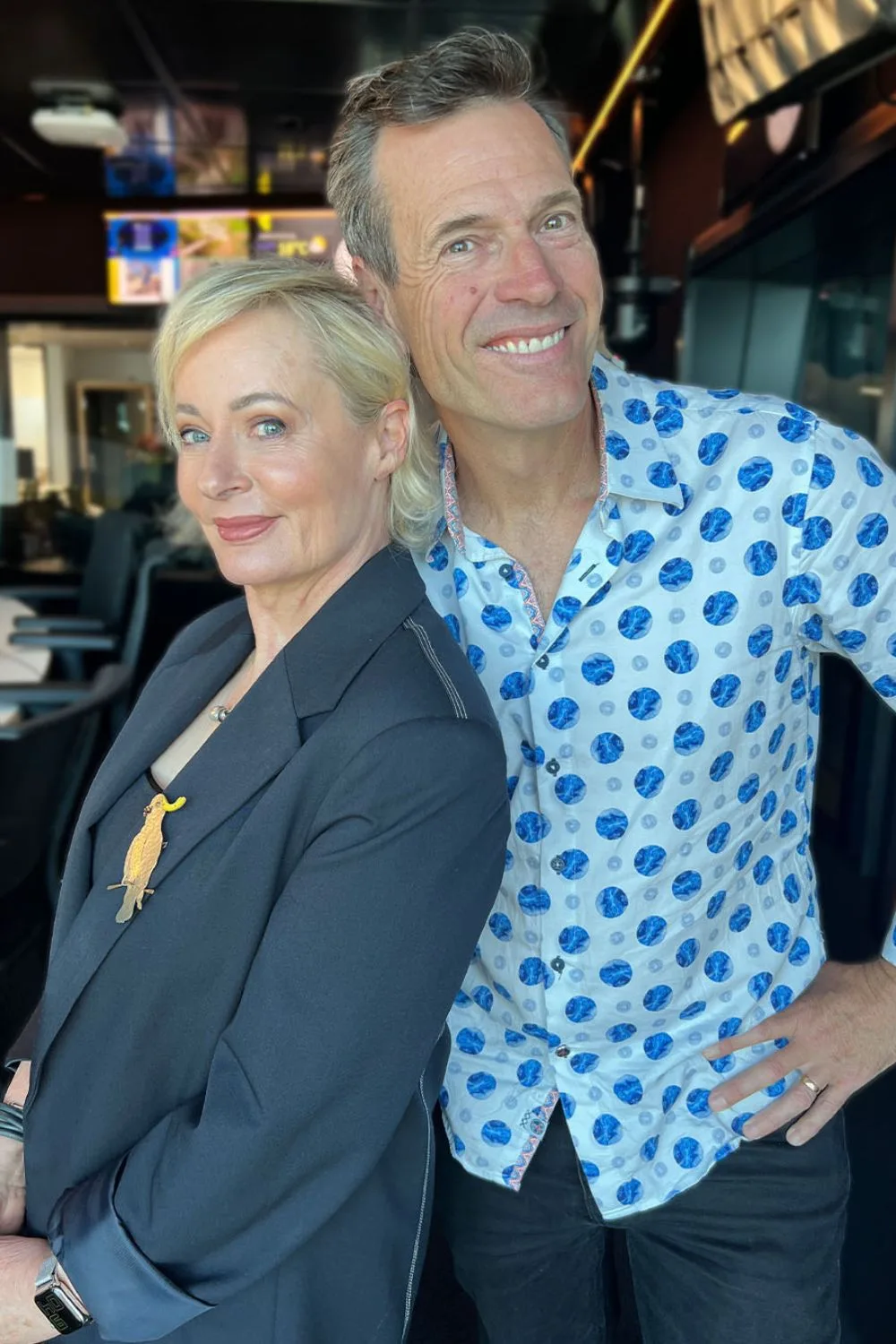 Jonesy and Amanda pose side by side for a photo