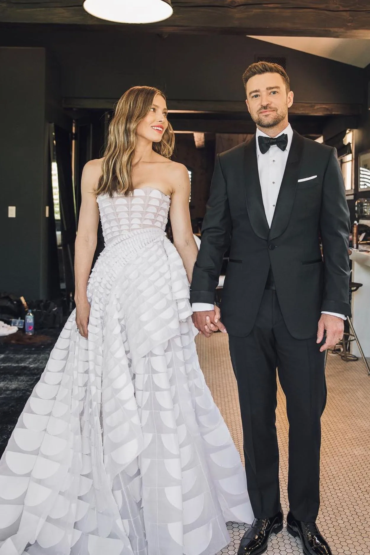 Justin Timberlake and Jessica Biel wear black tie outfits side by side