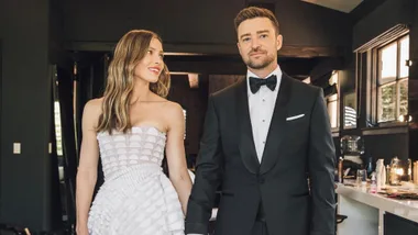Justin Timberlake stands next to wife Jessica Biel