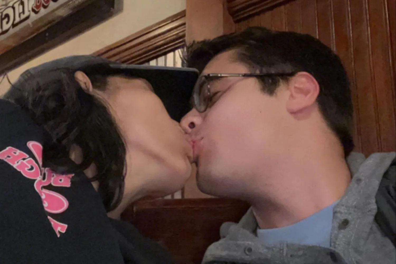 Conjoined twin Carmen Andrade kisses her husband Daniel