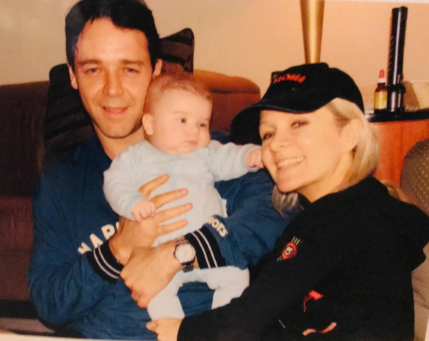 Russell Crowe and Danielle Spencer with one of their kids as a baby