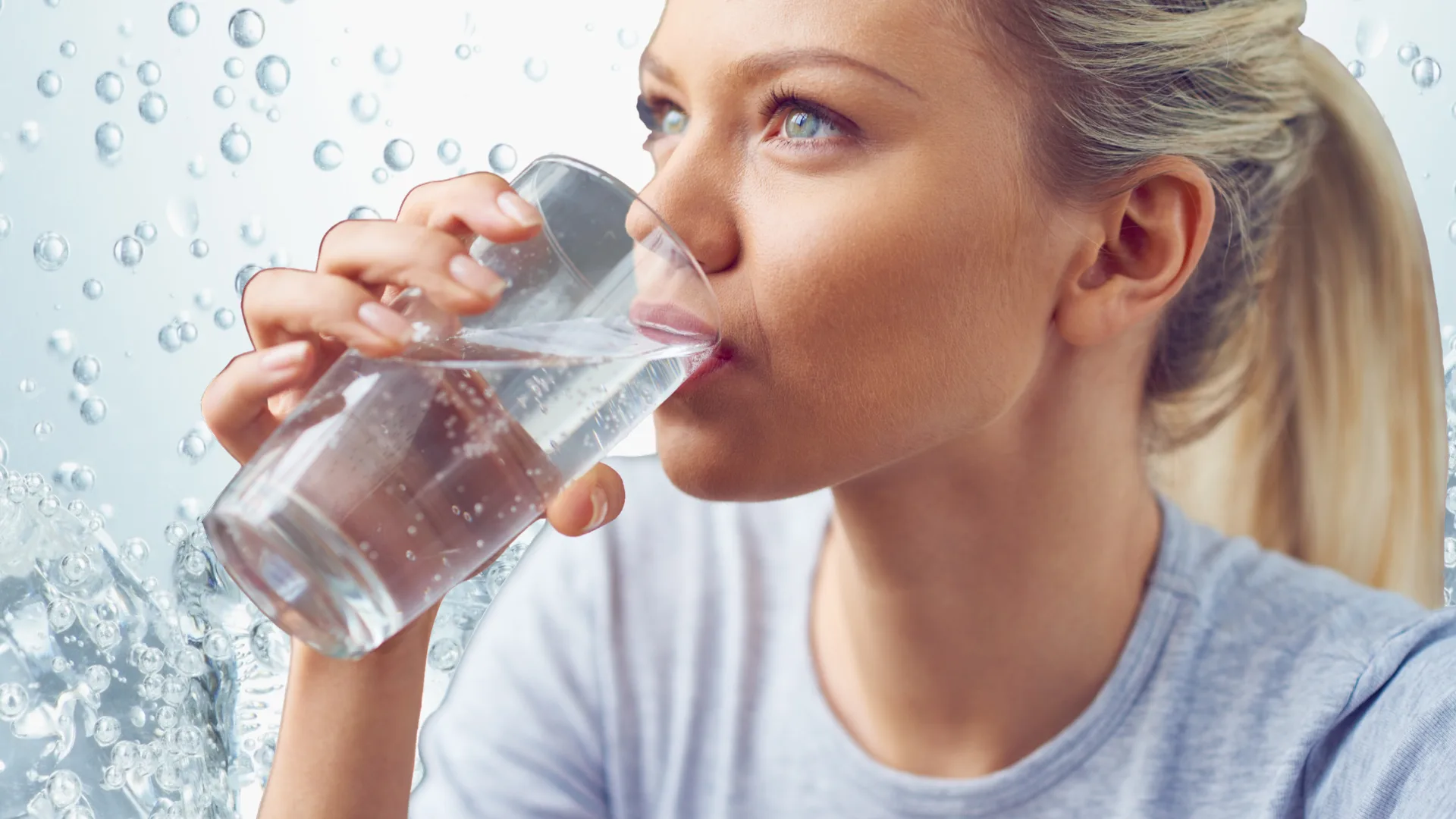 Woman drinking sparkling water