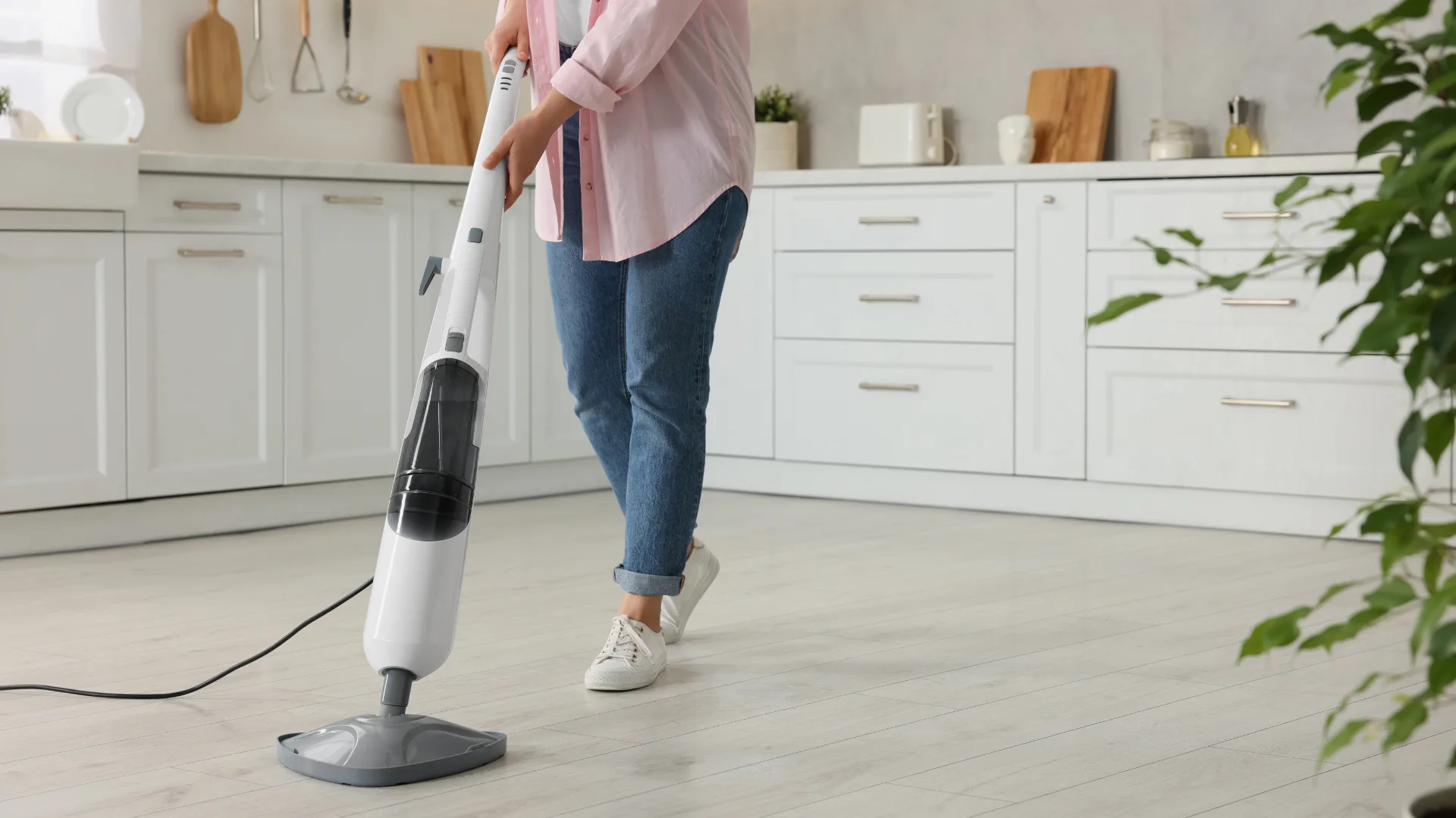 woman using a steam mop