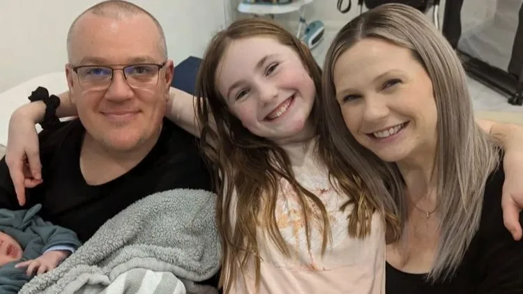 Charlotte O'Brien with her mother Kelly and stepfather Mat