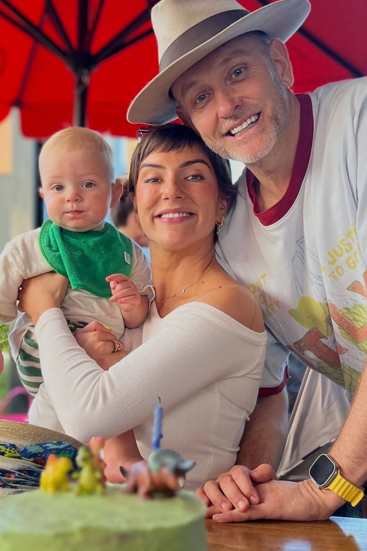 Big Brother narrator Mike Goldman with his wife and baby son