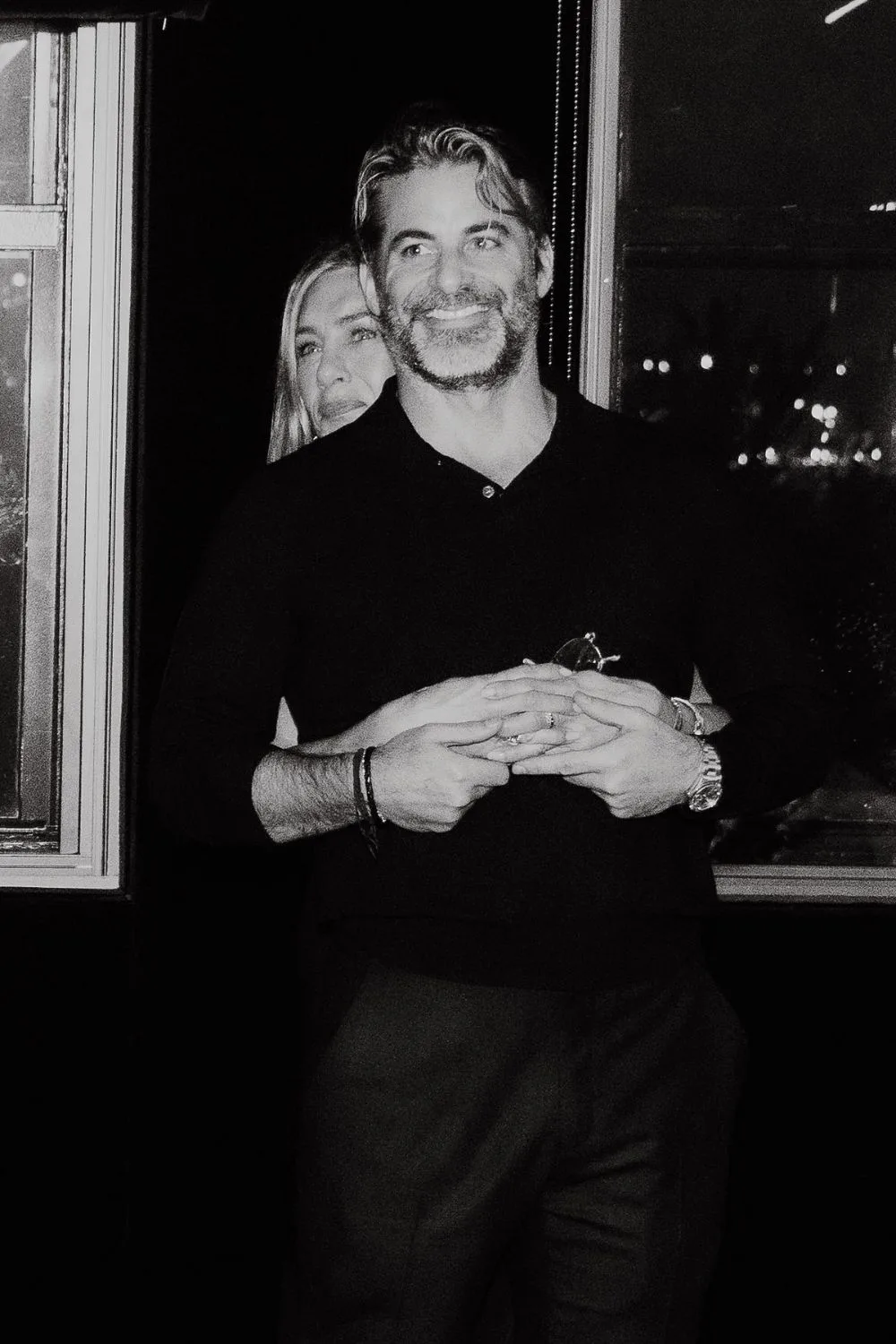 Jennifer Aniston hugs Jim Curtis