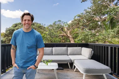charlie albone and an outdoor patio with outdoor couch and table