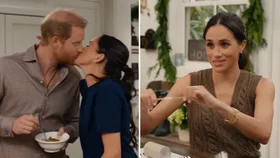 Prince Harry makes surprise cameo in Meghan Markle&rsquo;s Christmas special as they share on camera kiss