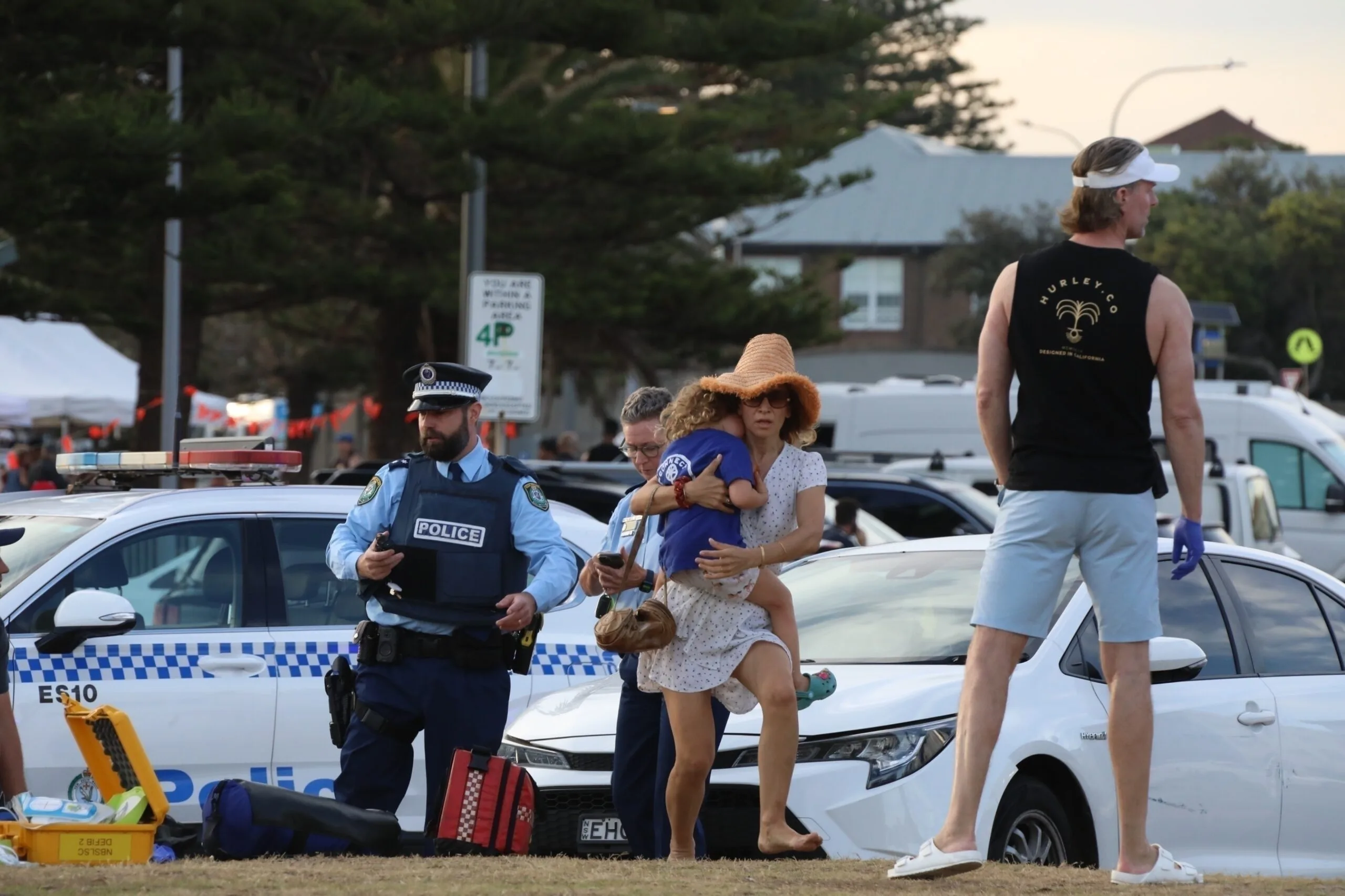 Families flee the Bondi Beach massacre
