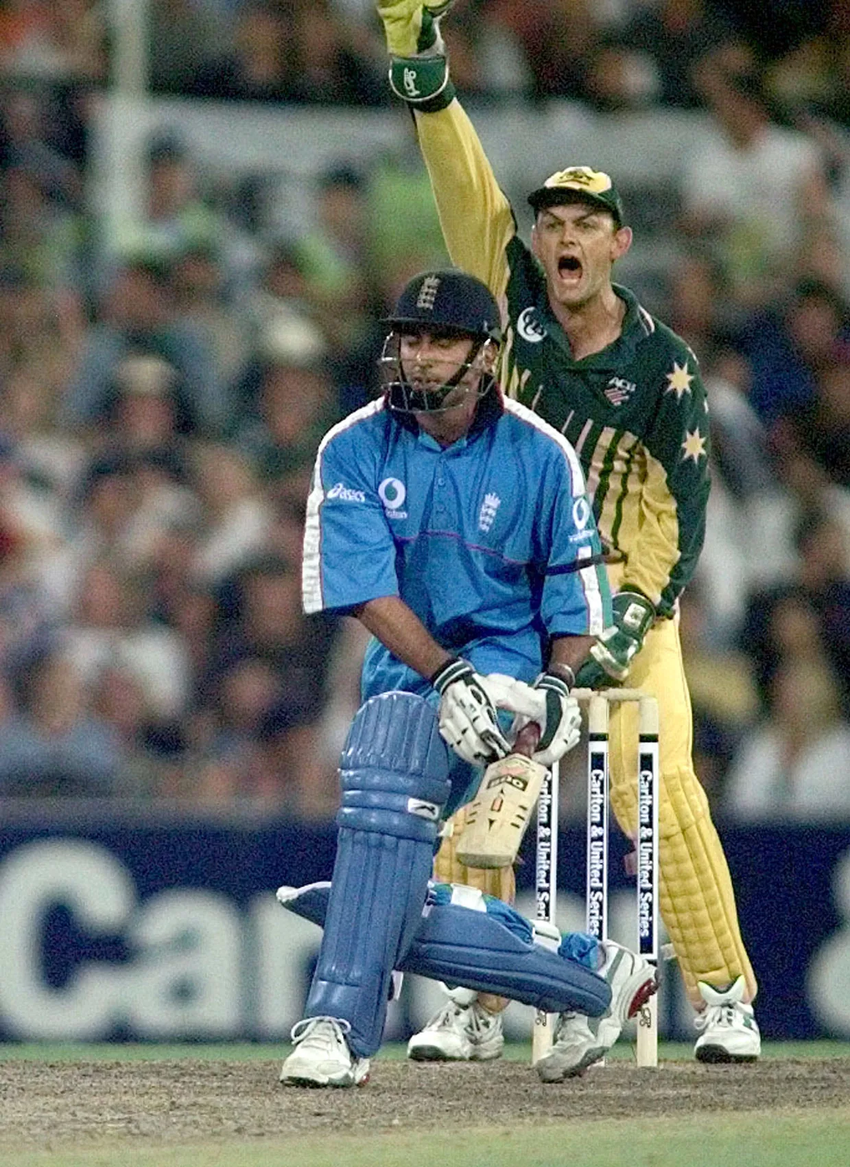 Adam Gilchrist playing cricket