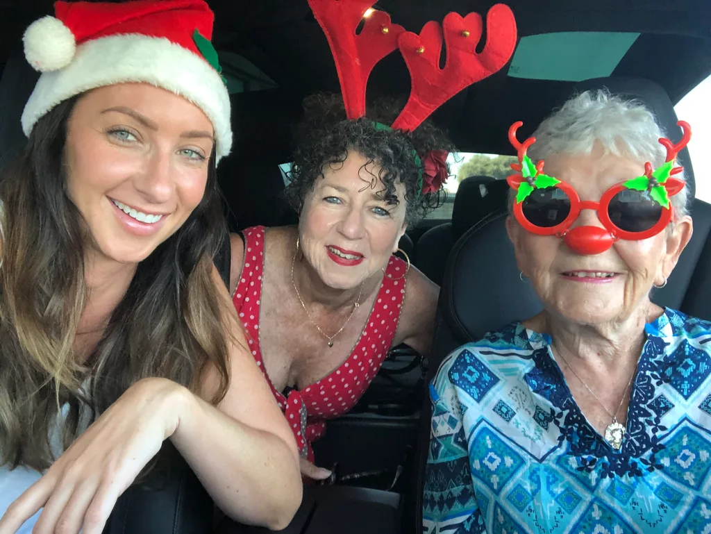 Gogglebox stars Isabelle Silbery, Kerry Silbery and Emmie Silbery in Christmas hats and glasses