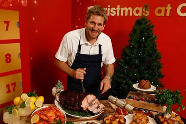 curtis stone with festive christmas food and drinks for Coles