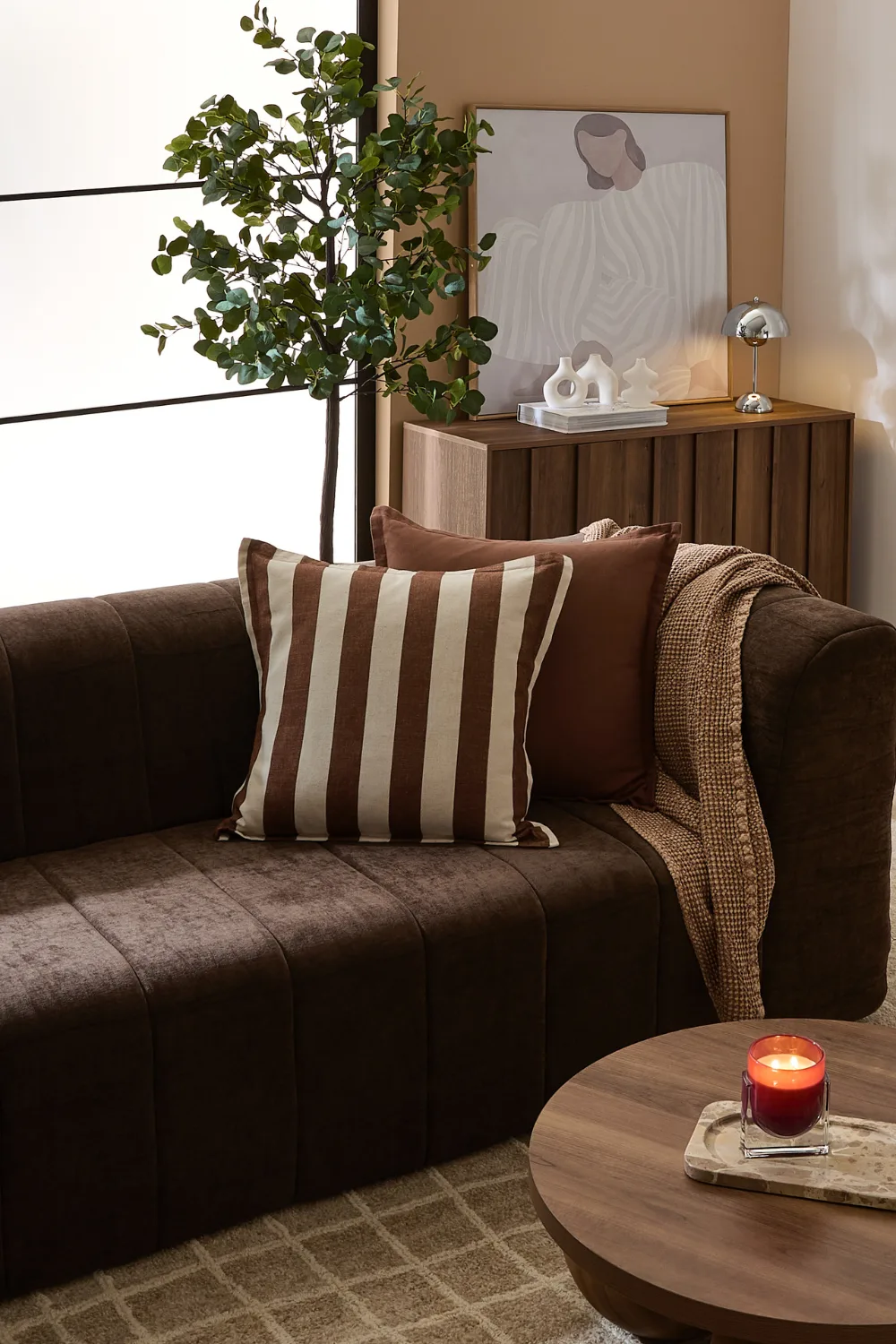 kmart feb living range chocolate brown cohch and stripe brown and cream cushion 