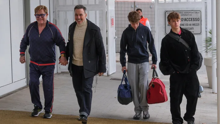 So grown up: Sir Elton John’s teenage sons Zachary and Elijah make rare appearance