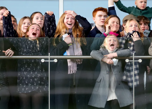 Mia Tindall, Savannah Phillips, Lena Tindall and Isla Phillips watch the racing as they attend the New Year's Day Racing Meet at Cheltenham Racecourse