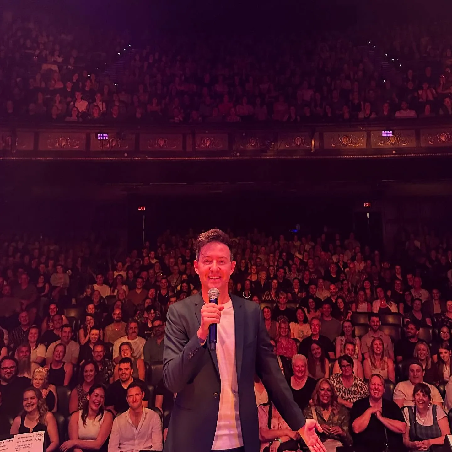 Nath Valvo doing stand-up comedy 