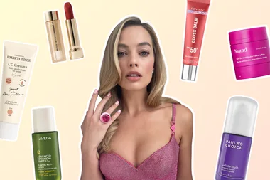 margot robbie surrounded by new beauty products