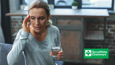 woman with hot flushes and headache