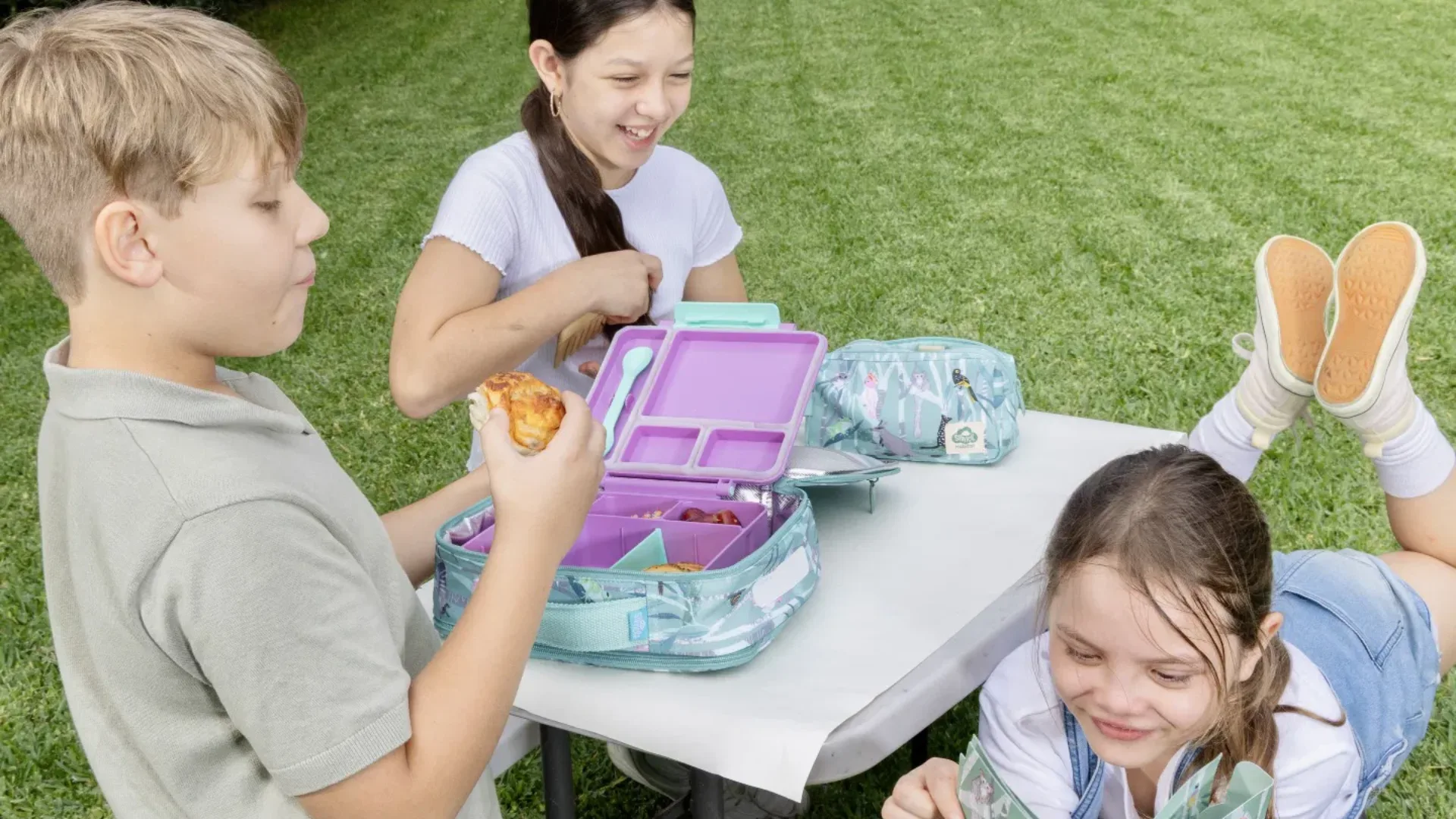 Kids eating school lunch from lunch box