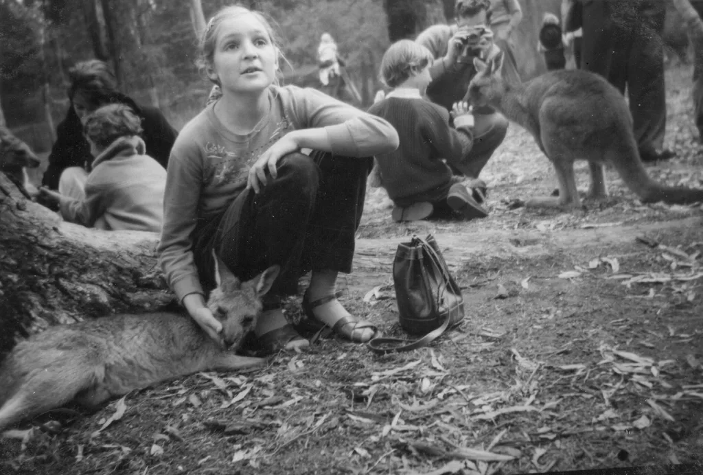 Merle at Healesville Sanctuary, Easter 1960 (we often went there at Easter) - patting kangaroo
