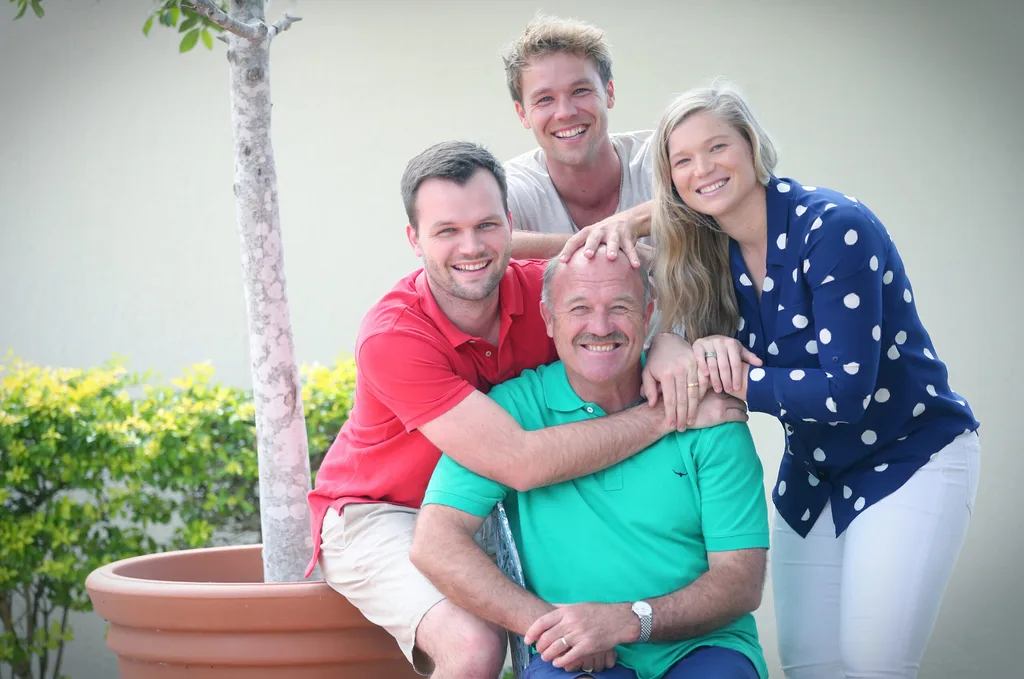 Wally Lewis with his three children