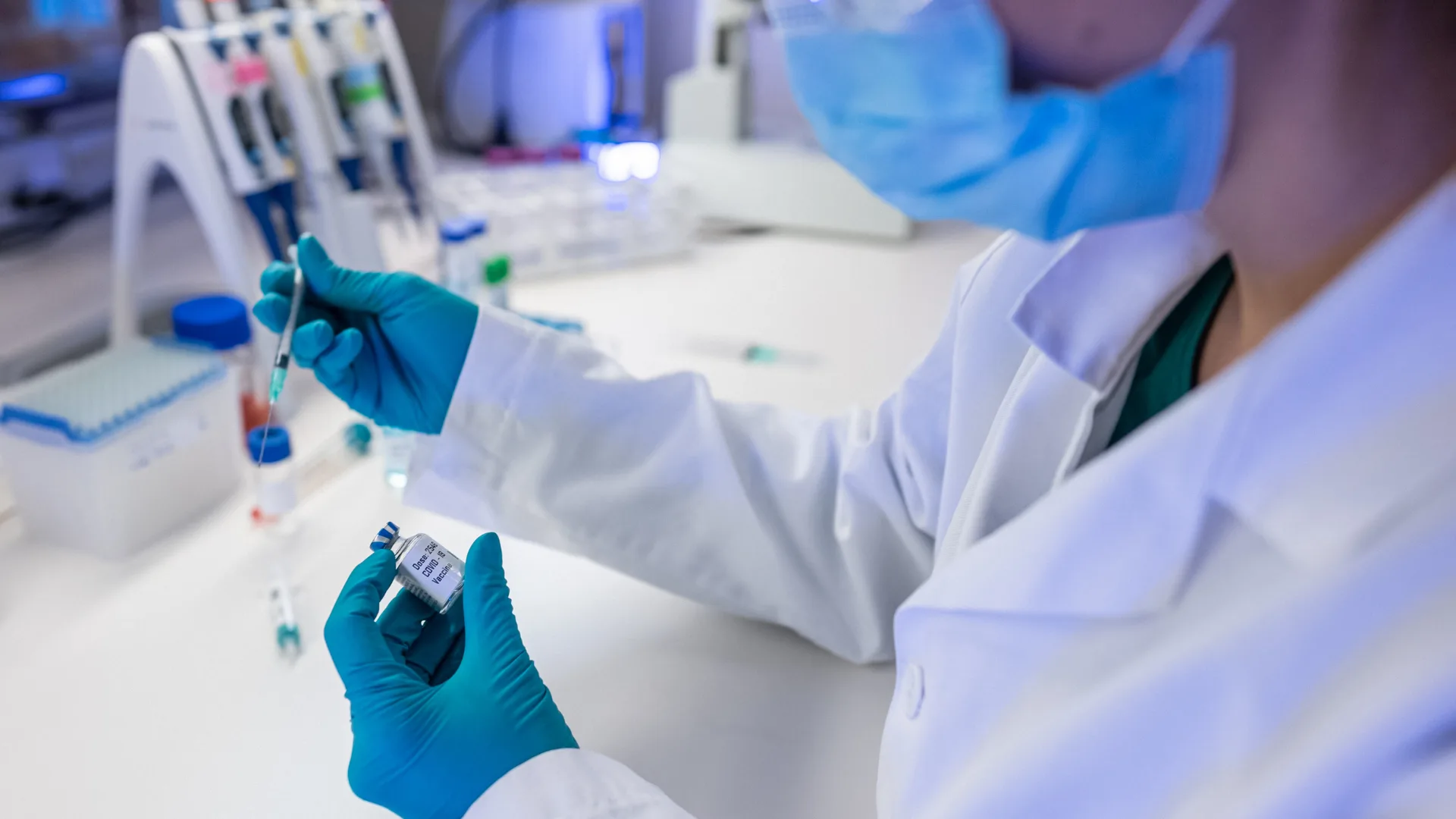 lab scientist testing vaccines