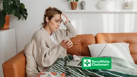 Woman sick on the couch
