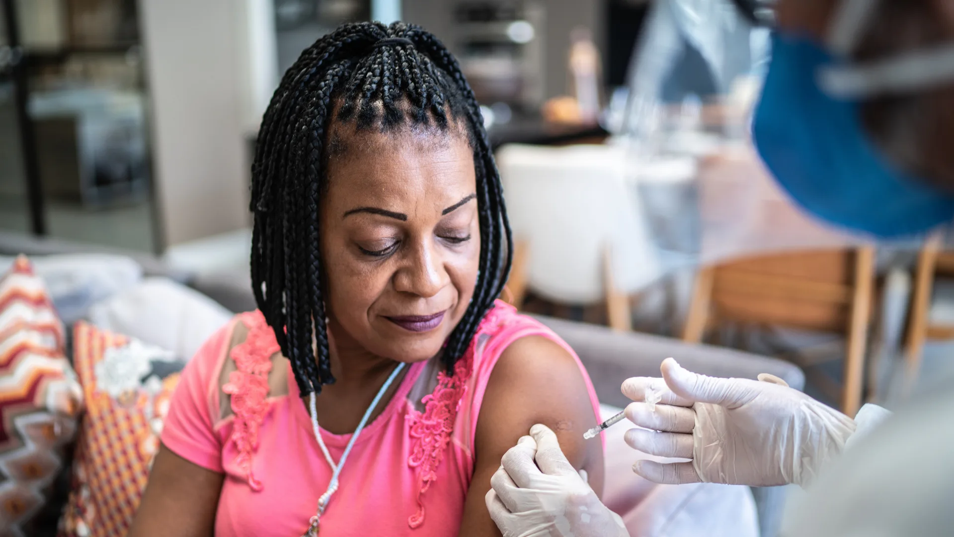woman getting booster shot
