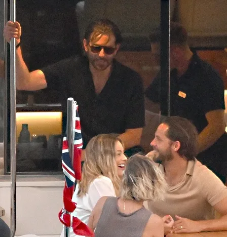 Bradley Cooper, Margot Robbie, Tom Ackerley