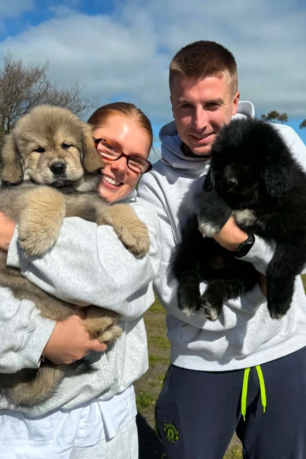 Brooke Warne, her fiance Alex and their new dogs
