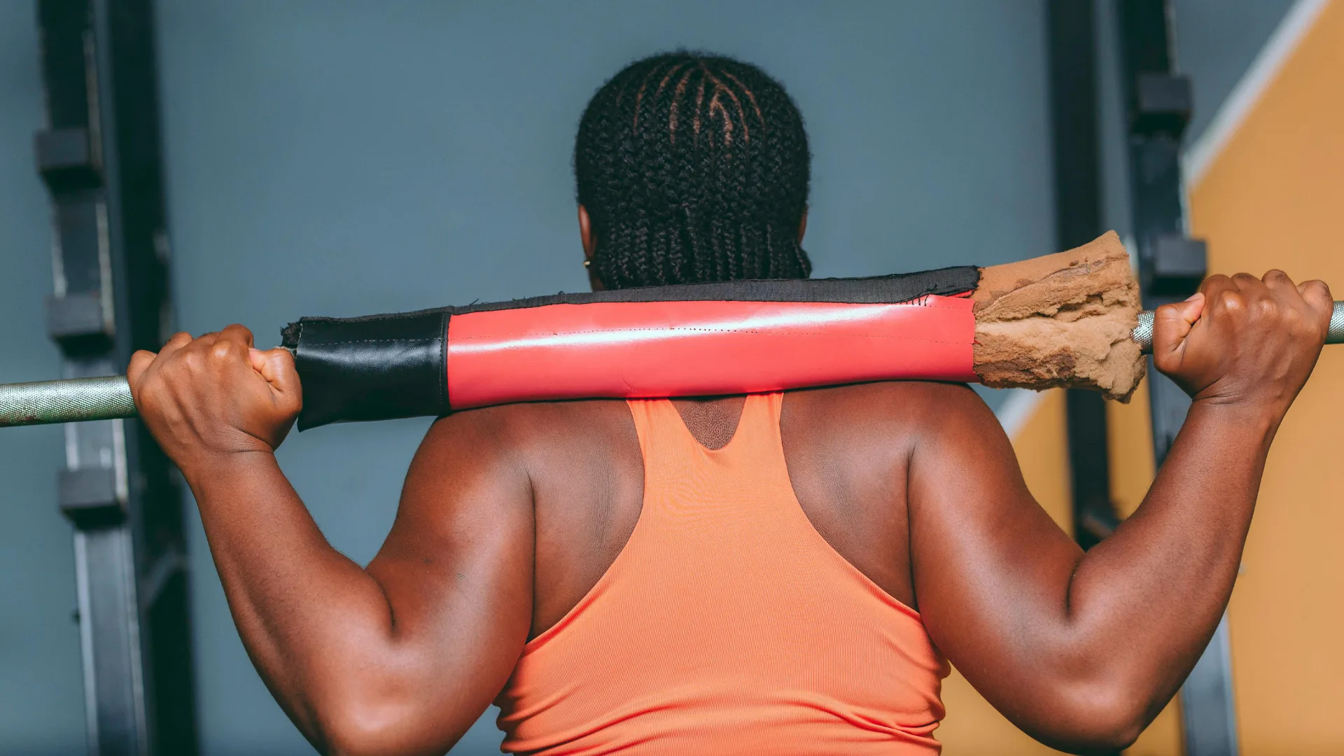 Woman lifting weight bar