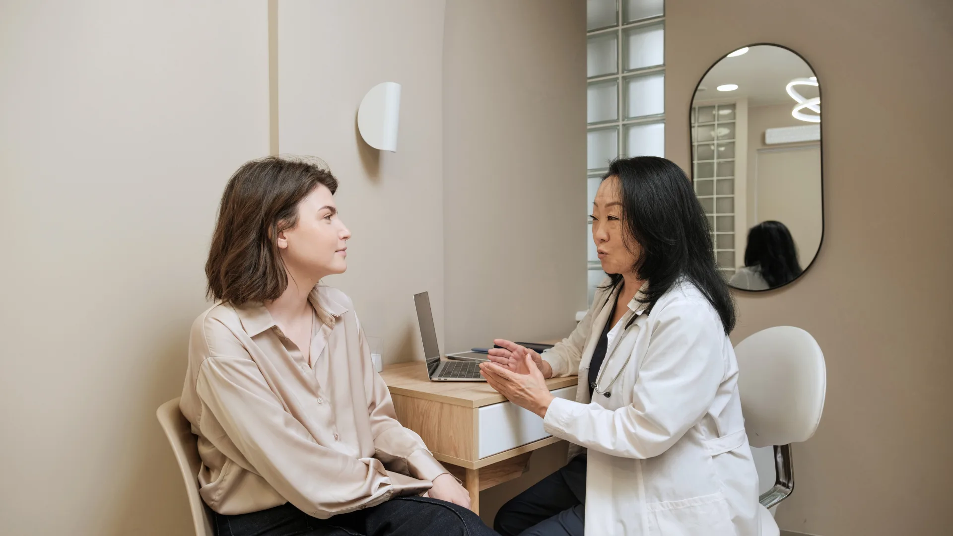 woman speaking to her doctor