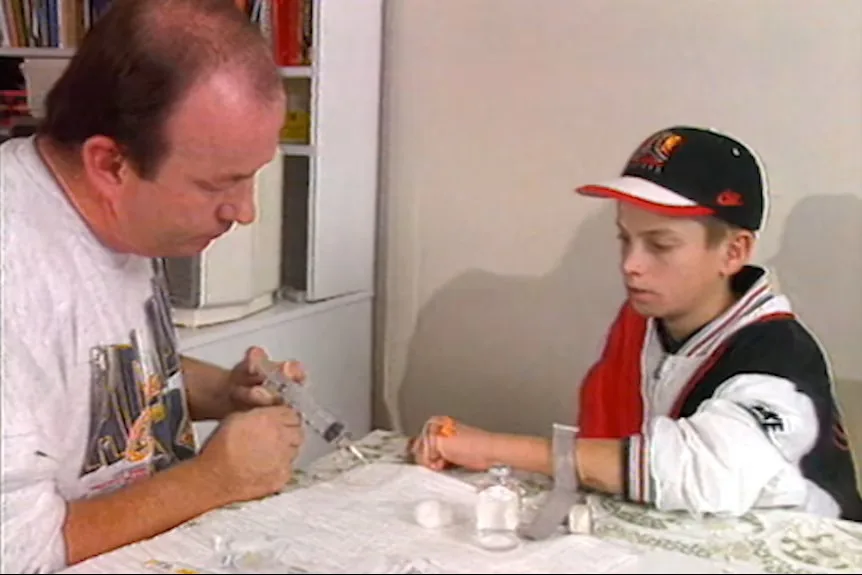 Tristan's father giving him blood product