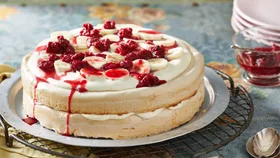 Brown Sugar Pavlova with Raspberry Sauce and Bananas