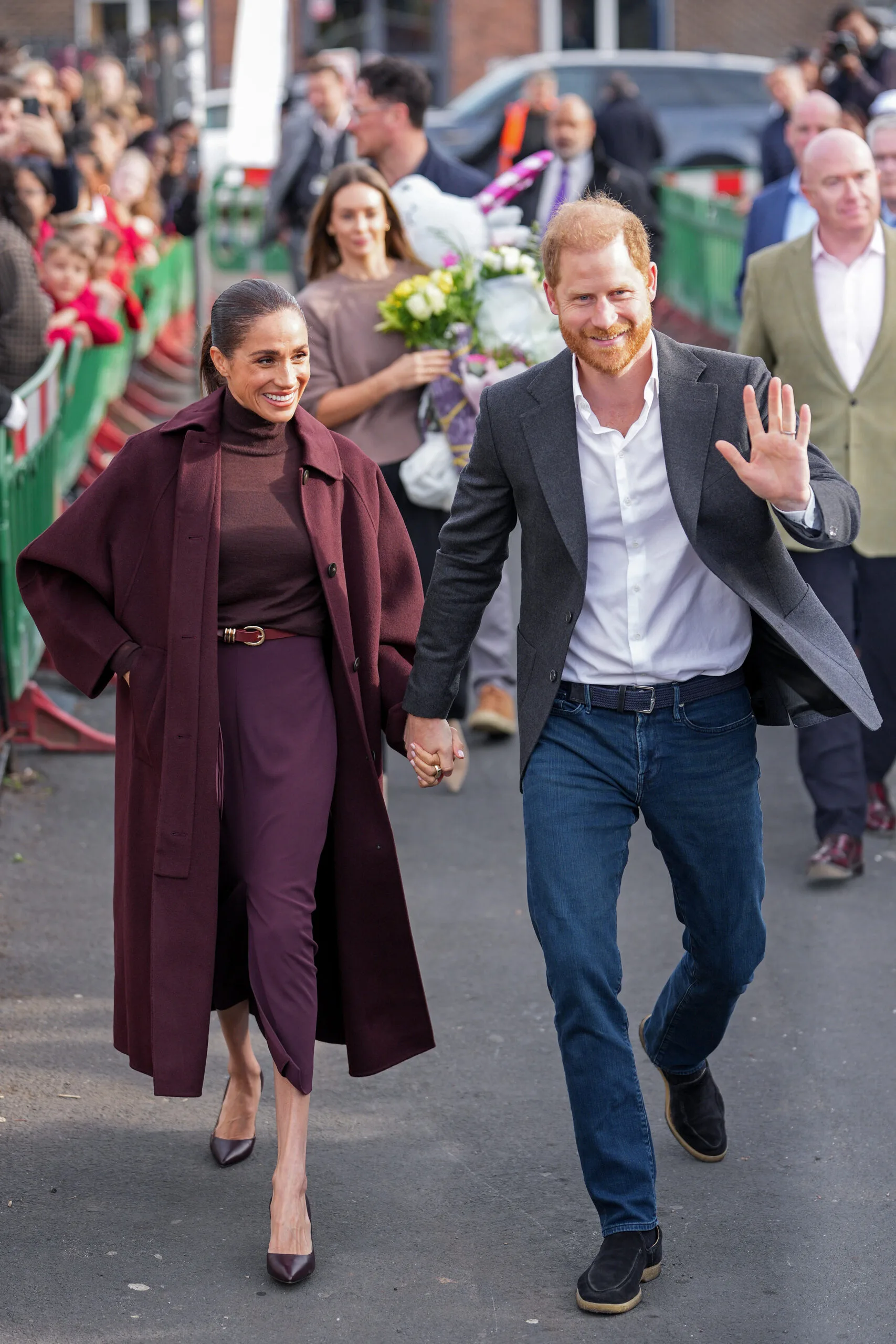 Meghan and Harry on streets of Nottingham surrounded by fans