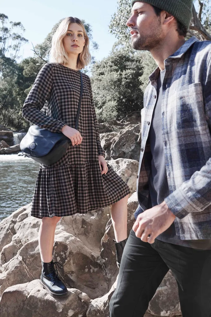 Women's drop hem midi dress, $28; Women's fold over cross body bag, $15; Women's chunky lace up boots, $30; Men's overshirt, $28; Men's honeycomb tee, $12; Mone's smart pant $28; all at Kmart.