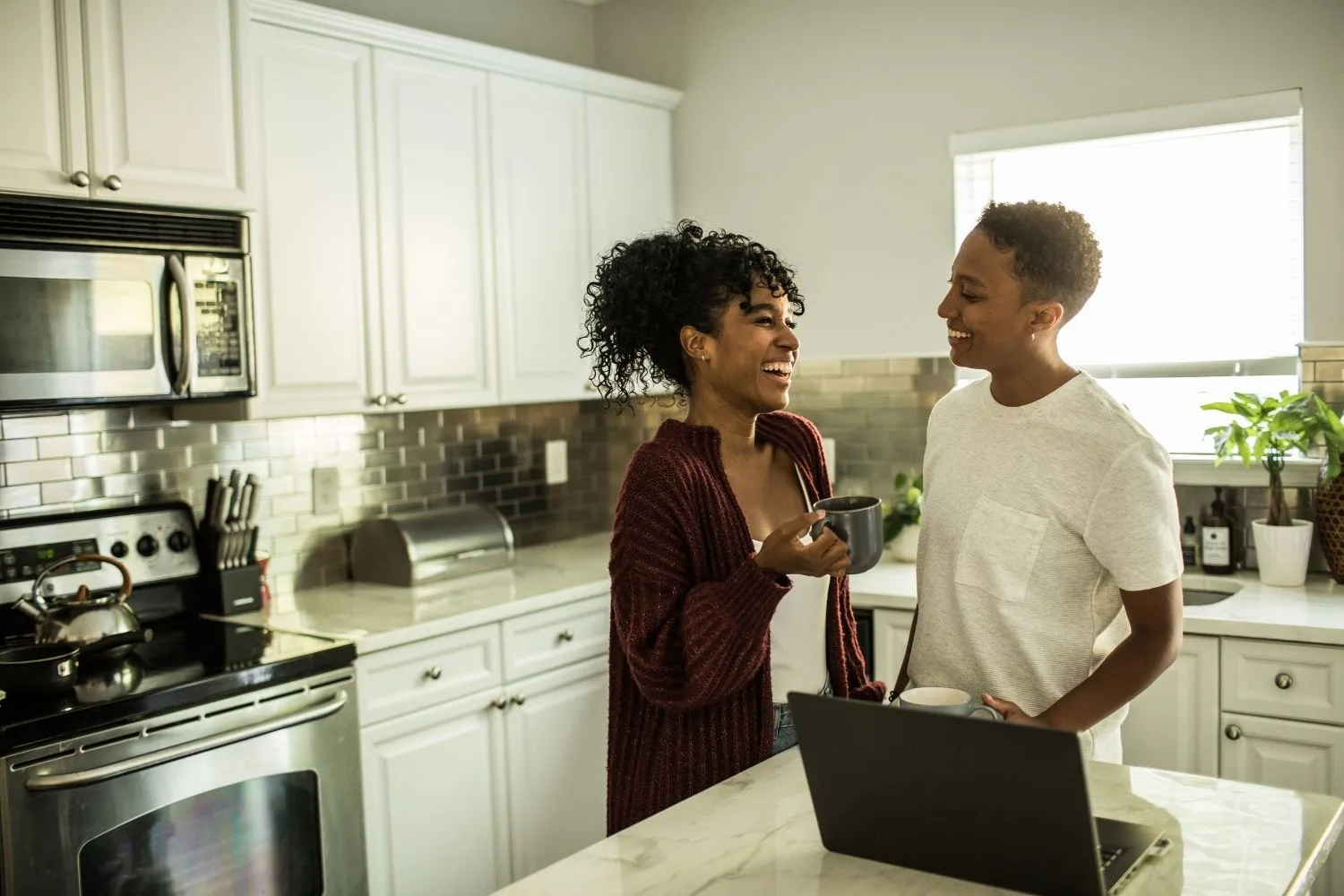 A couple in their kitchen