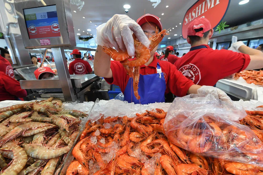 Whole prawns at a seafood market.