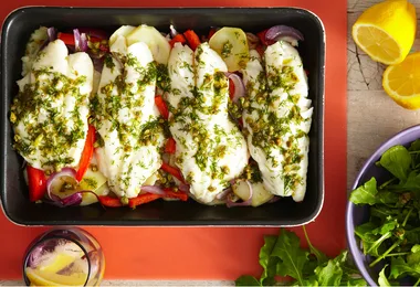 Seafood lovers gather ’round for this baked perch with lemon caper dressing